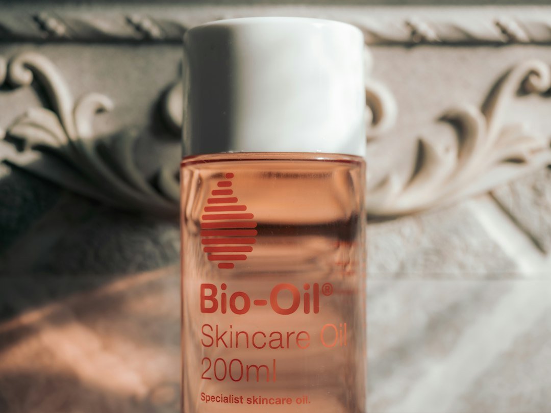 A labelled Bio-Oil skincare bottle photographed on a light surface